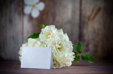 bouquet of beautiful white roses on table