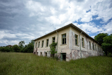 Fototapeta na wymiar Abandoned brick school building
