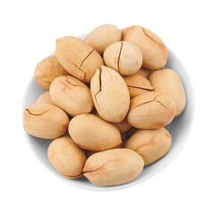 Pecan nuts in shell, in piala, isolated on a white background