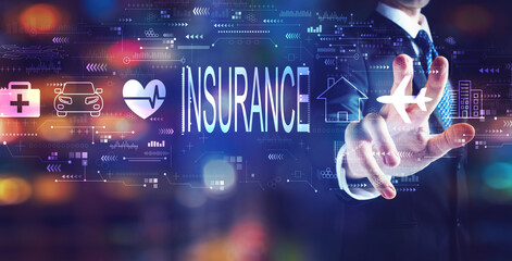 Insurance concept with businessman on night city background