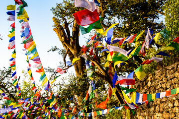 Colorful flags in Swayambhunath (Swayambu or Swoyambhu), an ancient religious architecture atop a hill, Kathmandu, Nepal
