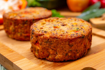 Tasty vegetarian food, burgers with Greek feta cheese, sweet red paprika, green olives and zucchini