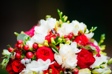 Wedding bouquet in the park. Bouquet of delicate flowers.