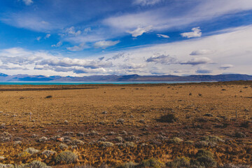 field lake sky and mountains