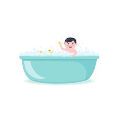 Happy baby taking a bath with yellow ducks, smiling boy in bubble bath, kid playing in the foam tub