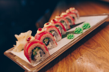 Large set of Sushi Rolls Warm Ebi Sake Unagi Spring. Assortment Philadelphia roll Dishes from Japanese raw fish in one plate in luxury traditional restaurant. Japan food menu service