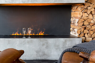 luxury studio apartment with a free layout in a loft style in dark colors. Stylish modern kitchen...