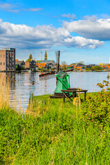 It's Windmill in Zaanse Schans, quiet village in Netherlands, province North Holland