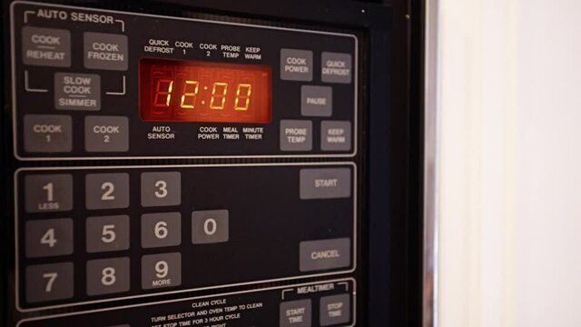 Retro Digital Microwave Oven Clock Turning From 11:59 To 12:00