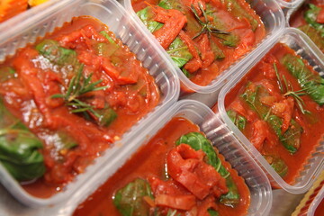 tomato sauce and kale in a bowl