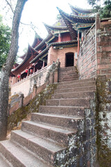 Fototapeta premium February 2019. Shibaoshan. A hidden gem off the beaten track for hiking, visiting ancient sites and seeing ethnic people who live traditionally is Precious Stone Mountain in Dali. The gemstone mountai