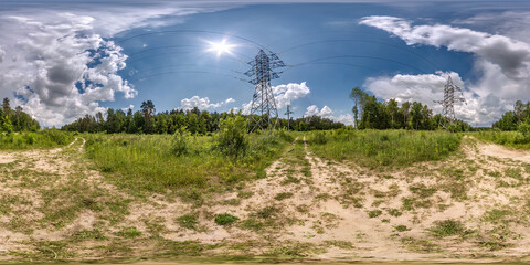 Obraz premium full seamless spherical hdri panorama 360 degrees angle view near high voltage electric pylon towers on gravel road in forest in equirectangular projection, VR AR content