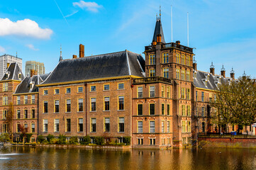 Fototapeta premium It's The Ridderzaal in Binnenhof with the Hofvijver lake. Meeting place of States General of the Netherlands, the Ministry of General Affairs and the office of the Prime Minister of Netherlands