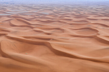 Sand Dune in the Sahara / In the Sahara Desert, sand dunes to the horizon, Morocco, Africa.