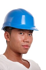 Portrait of young asian construction worker looking at camera, smiling, isolated on white. 