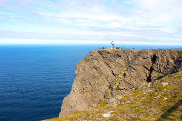 Nordkapp Cliff and rock and sea and sky and horizon