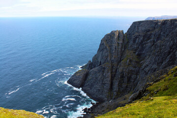 Nordkapp Cliff and rock and sea and sky and horizon