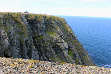 Cliff and sea and sky and horizon and North Cape