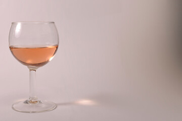 glass of rose wine close up