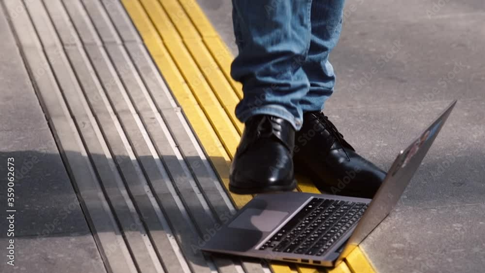 Poster imitation of breaking a laptop on the ground. illustration of computer security and hacking computer