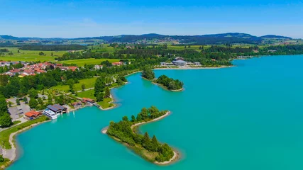 Foto op Canvas Aerial view over Lake Forggensee at the city of Fuessen in Bavaria Germany © 4kclips