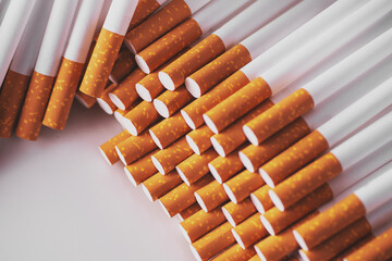 Cigarette filter tubes. Tobacco product. Close up of a smoking cigarettes .