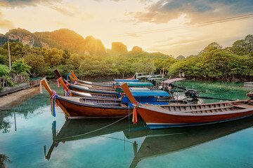 Traditional long-tail boats in Krabi region in Thailand in the summertime