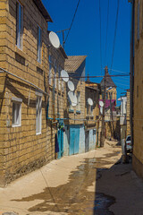 Narrow street in the old town of Derbent in the Republic of Dagestan, Russia