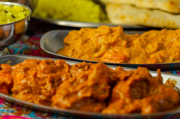 Chicken Madras and Chicken Tikka Masala with Pilau Rice, Naan Breads and, Onion Bhajis