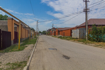 Fototapeta na wymiar Street in suburbs of Grozny, Russia.