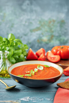 Vertical shot of deloshioue and refreshing summer red soup gaspacho