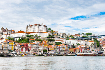 Fototapeta premium It's Ribeira quarter, Valley Douro, traditional sight, UNESCO World Heriatge site. View from the River Douro, one of the major rivers of the Iberian Peninsula (2157 m)