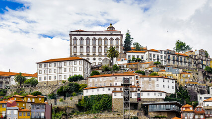It's Beautiful houses on the coast of the River Douro in Porto, Portugal. View from the River Douro, one of the major rivers of the Iberian Peninsula (2157 m)