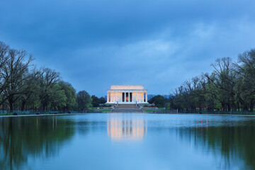 Lincoln Memorial at National Mall at dawn with gloomy sky. The memorial is one of the main democratic symbols in the United States.