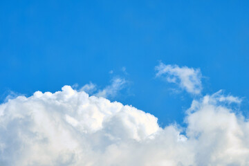 White clouds in the blue sky copy space