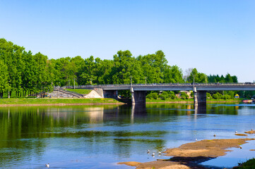 Fototapeta na wymiar It's Bridge over the river in summer
