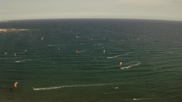 Bay with windsurfers and kiters. Tenerife, Spain