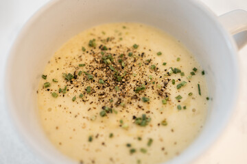 Leek soup with chives and pepper