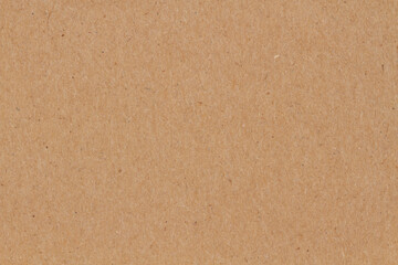 Fototapeta na wymiar Brown textured cardstock paper closeup background