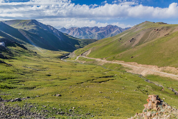 Fototapeta na wymiar Mountain road near Song Kul lake, Kyrgyzstan