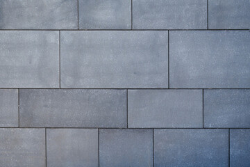 Background from dark tiles under granite style.