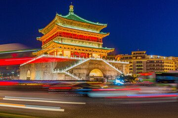 Fototapeta na wymiar Evening view of the traffic around Bell Tower in Xi'an, China