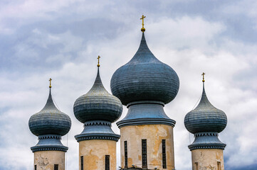 It's Chapels of the Tikhvin Assumption Monastery and the reflection in the water, a Russian Orthodox monastery founded in 1560, (Tihvin, Saint Petesburg region, Russia)