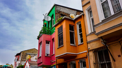 Obraz premium View of Balat houses / homes where is a historic district in Istanbul, old city in Marmara region, Turkey. Traditional Ottoman houses in Istanbul's European side. 
