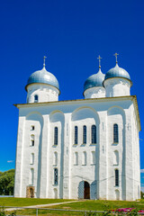 It's St. George's (Yuriev) Monastery, Russia's oldest monastery. It is part of the World Heritage Site named Historic Monuments of Novgorod and Surroundings.