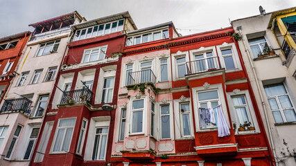 Fototapeta na wymiar View of Balat houses / homes where is a historic district in Istanbul, old city in Marmara region, Turkey. Traditional Ottoman houses in Istanbul's European side. 