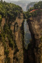 Fototapeta premium Natural rock bridge in Wulingyuan Scenic and Historic Interest Area in Zhangjiajie National Forest Park in Hunan province, China