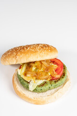 Vegan or vegetarian burger with spinach and potatoes. Healthy low calorie food, nutritious, with antioxidants, rich in folic acid and that improves intestinal transit. Ideal to take care of yourself