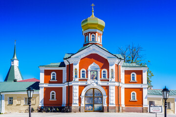 Fototapeta na wymiar It's Territory of the Valday Iversky Monastery, a Russian Orthodox monastery founded by Patriarch Nikon in 1653. Lake Valdayskoye in Valdaysky District of Novgorod Oblast, Russia,