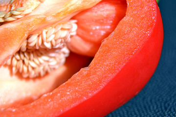Red pepper with seeds inside. Extreme macro shot.